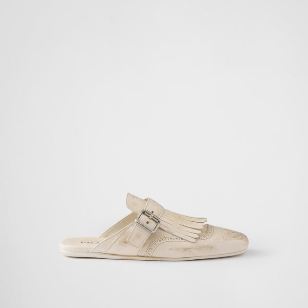 Shuffle fringed leather mules