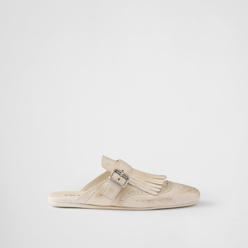 Shuffle fringed leather mules