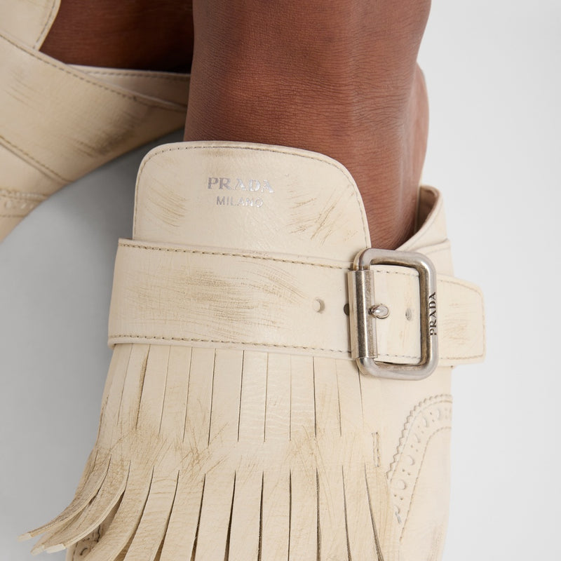Shuffle fringed leather mules