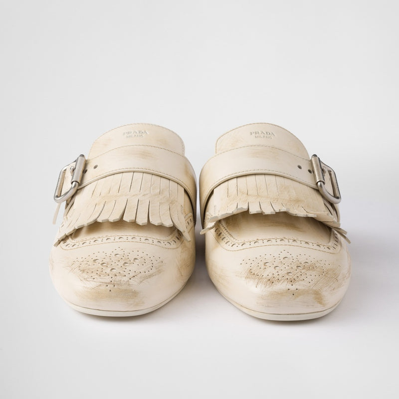Shuffle fringed leather mules