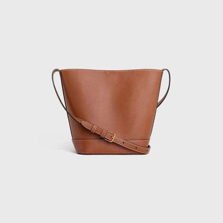 SMALL LEATHER BUCKET BAG TRIOMPHE