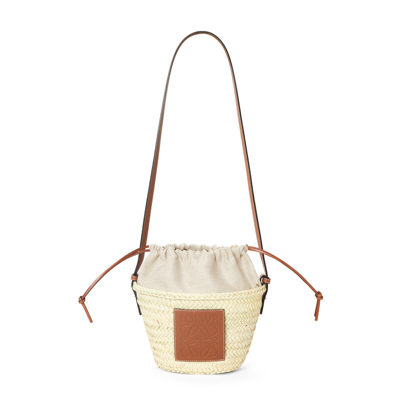 Drawstring bucket bag in palm leaf and calfskin