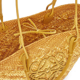 Anagram basket bag in iraca palm and calfskin