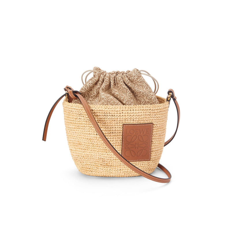 Pochette bag in raffia, Anagram jacquard and calfskin