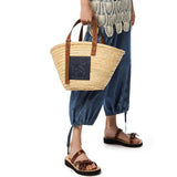 Basket bag in palm leaf and calfskin