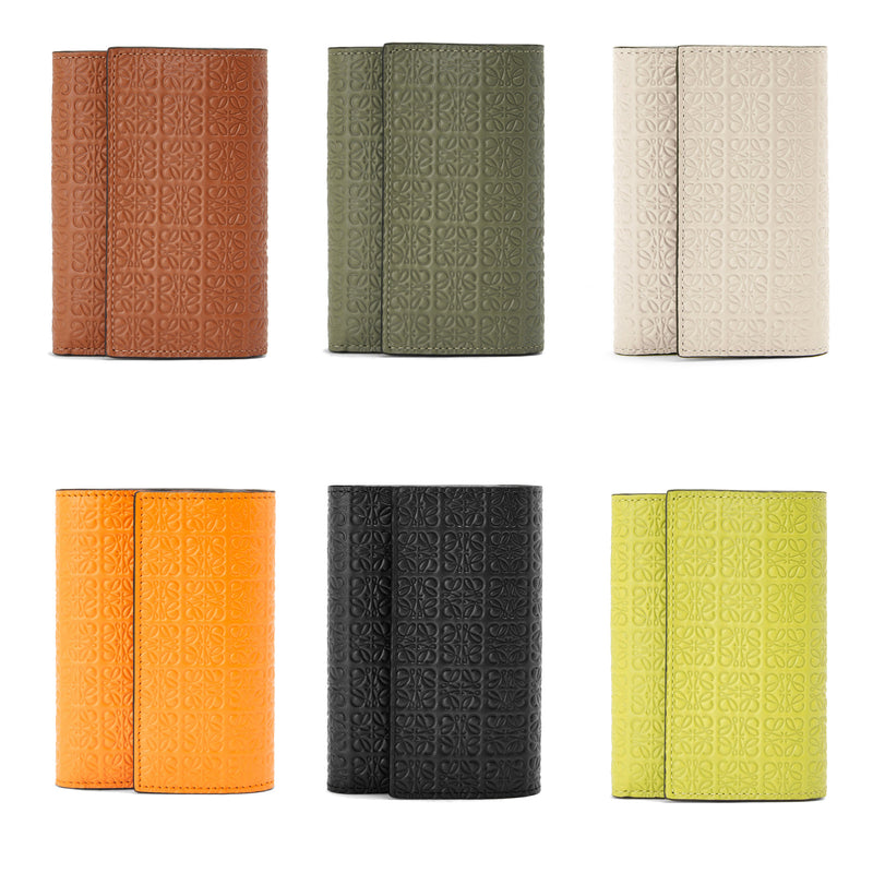 Repeat small vertical wallet in embossed silk calfskin