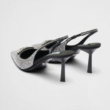 Satin slingback pumps with crystals