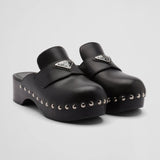 Studded leather clogs