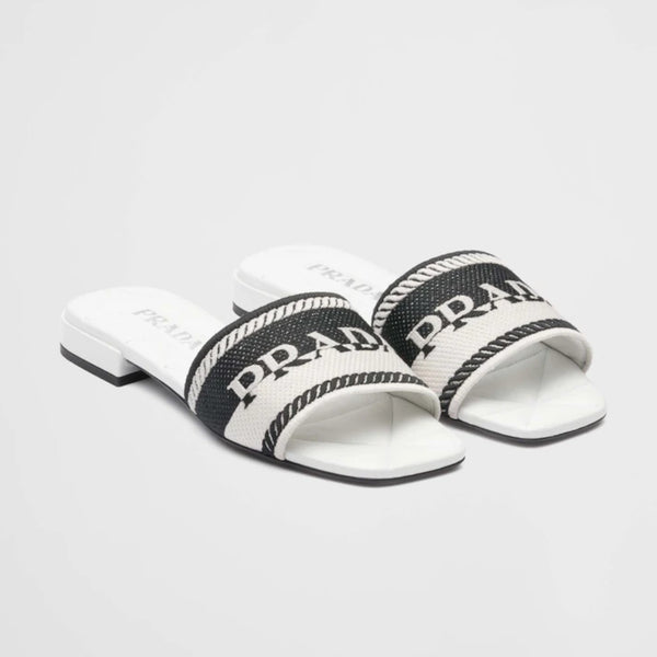 Embroidered fabric slides
