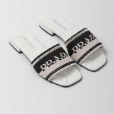 Embroidered fabric slides