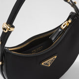 Prada Arqu? Re-Nylon and brushed leather mini shoulder bag