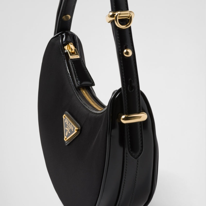 Prada Arqu? Re-Nylon and brushed leather mini shoulder bag